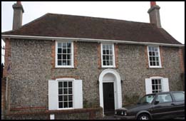 Double fronted brick or flint faced